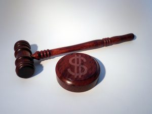 Gavel with money symbol